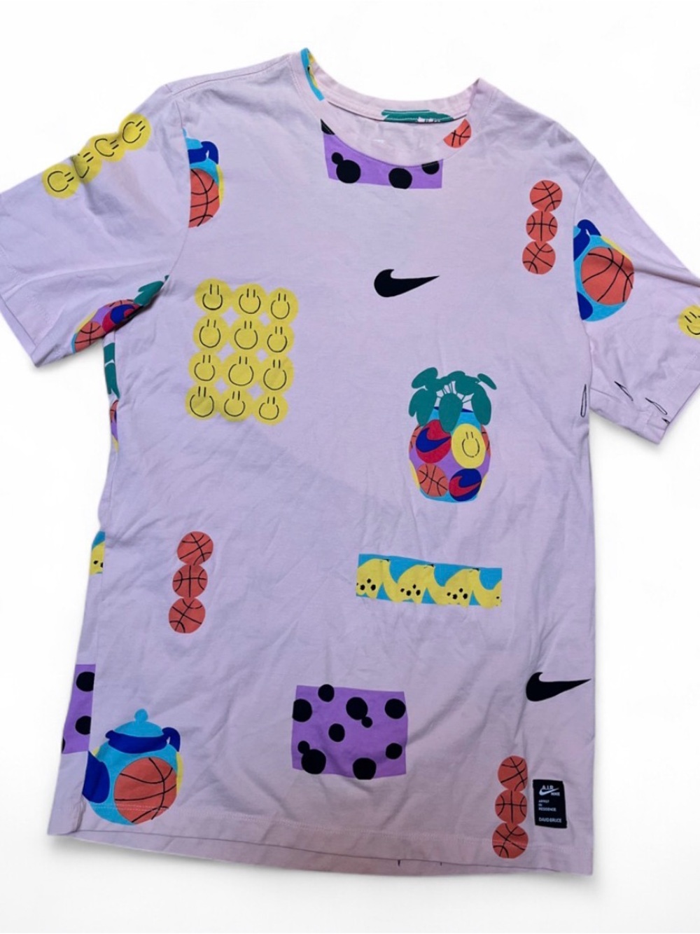 Nike Pink Short Sleeve Tee with Multicolor Sports Graphics